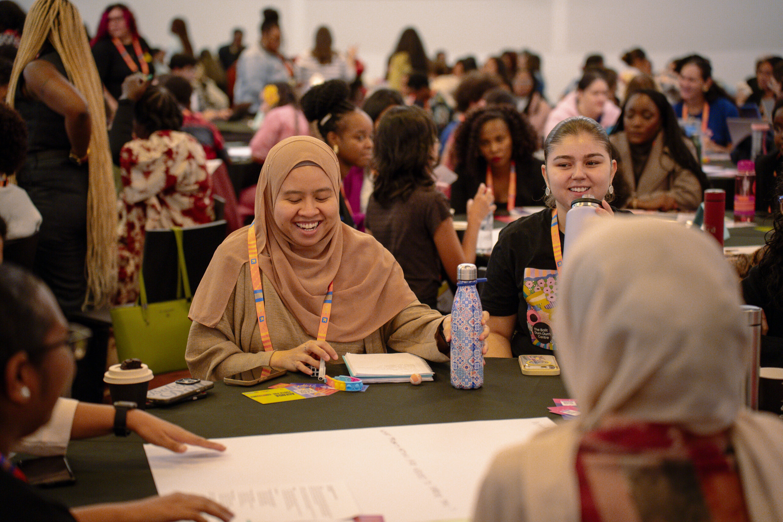 Participants discussing global health at a Women Deliver event