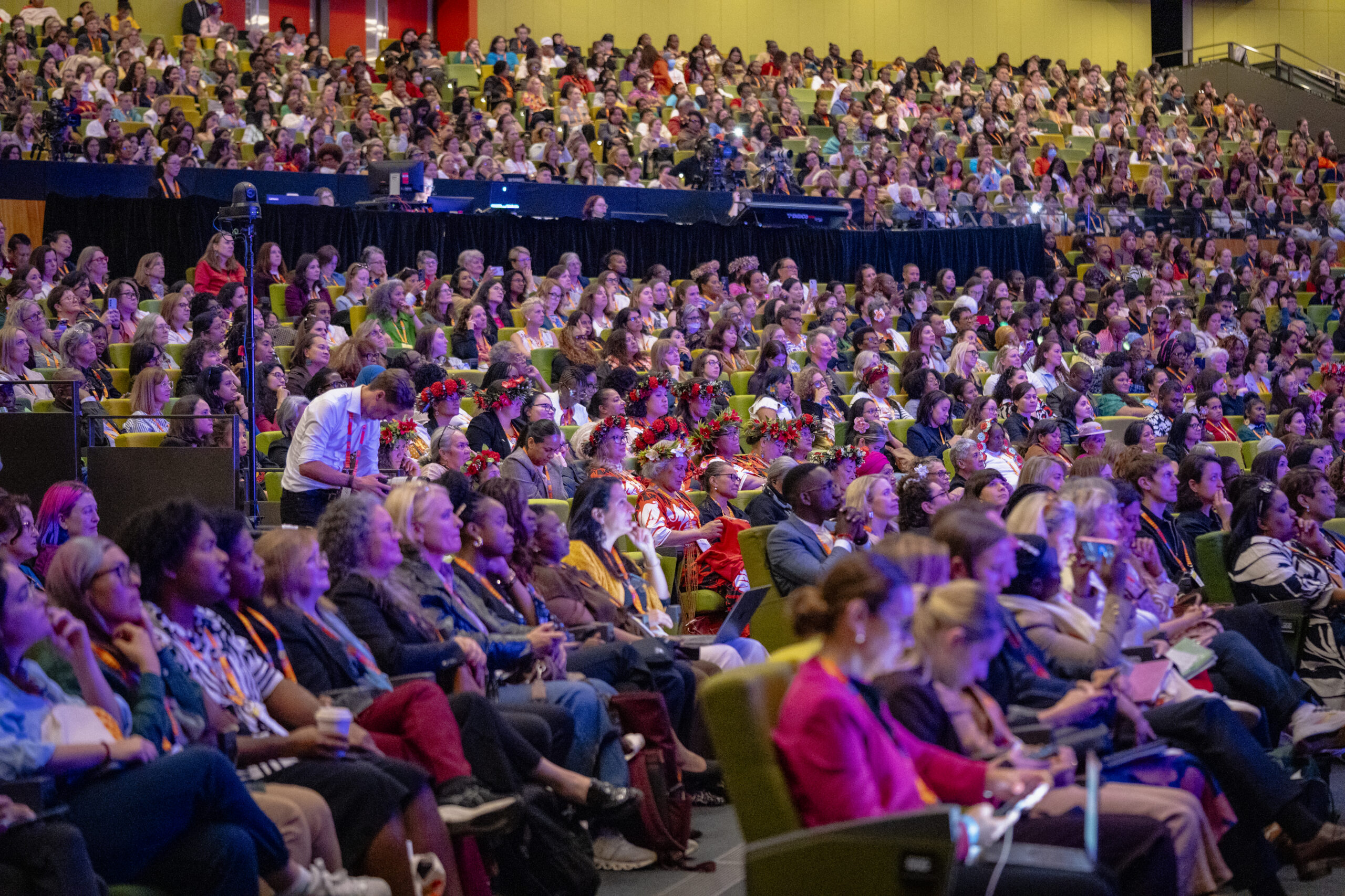 Participants convening at a Women Deliver event
