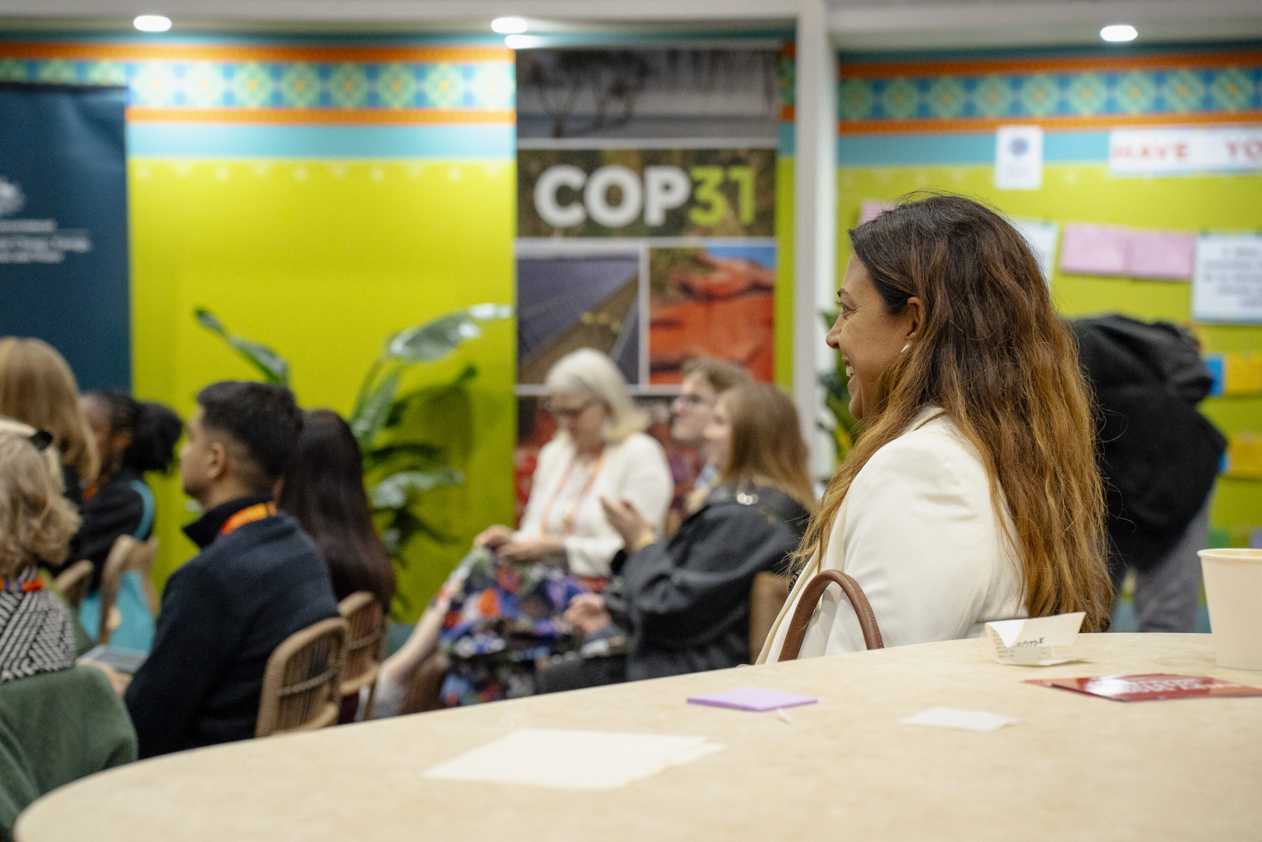 A speaker addressing participants at a Women Deliver event